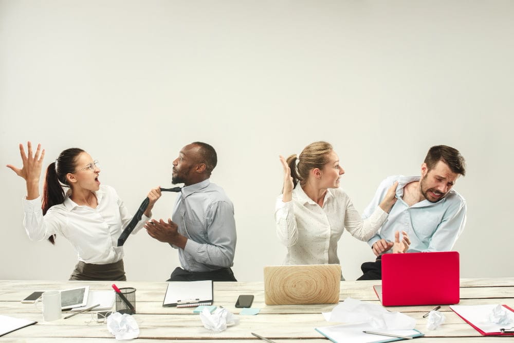 young-men-women-sitting-office-working-laptops-emotions-concept